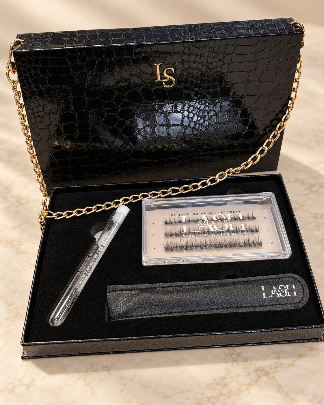 Lash Shack La Borsetta starter set in Black – open, showing the contents, angled view